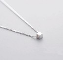 Damhalsband med kub 1