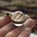 Damhalsband med en planet D378 11
