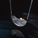 Kvinnors halsband med en fisk i vattnet 3