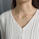 Damhalsband med ansikte 1