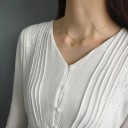 Damhalsband med ansikte 2