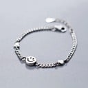 Damesarmband met smiley en hartjes 1