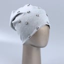 Damsmössa i beanie-stil med silverfärgade stjärnor Löst fallande snitt Blandning av polyester och bomull Huvudomfång 54 till 59 cm 8