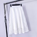 Damernas håliga midi kjol med underkjol Mönster av runda hål Utvidgad A-linjeformad stil Bred elastisk midja Polyester och elastan 1