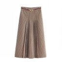 Dam lång plisserad kjol med geometriskt mönster i bruna nyanser Smalt bälte med spänne i guld A-linjeformad skärning Polyester och akryl 1