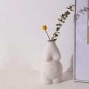 Dekorativ vase formet som en kvindekrop 1