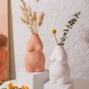Dekorativ vase formet som en kvindekrop 8