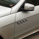 3D klistermärken för bil imitation av ventilationsöppningar Ett par dekorationer för motorhuv eller skärm Grå utförande med plastisk effekt Mått 40 x 4