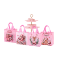 4 sacs-cadeaux de Noël 23 x 22 x 11 cm en tissu non tissé Père Noël Sacs réutilisables avec motifs et décorations de Noël 4