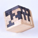 Trä 3D-pussel i form av en kub för barn och vuxna Utbildande pussel av ljusa och mörka bitar i olika former 6,8 x 6,8 x 6,8 cm 6