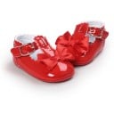 Zapatillas de piel charol para niña 16