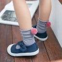 Calcetines de niña con pompón 8