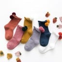 Calcetines de niña con pompón 10