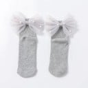 Calcetines de niña con lazo grande y perlas 6