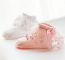 Calcetines de niña con volantes y lazo 4