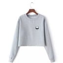 Dams kort hoodie med motiv av utomjording på bröstet Rund halsringning Långa ärmar med ribbad mudd Borstad insida 2