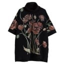 Dams oversized hoodie med polokrage Svart med stort blommönster Breda ärmar upp till armbågen Sidofickor Sprund på sidorna Polyester 2