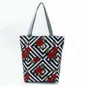 Damväska med blommönster Högre form med utvidgad botten 27 x 37 x 8 cm Långa grå handtag Polyester Mönster av rosor och vallmo 12