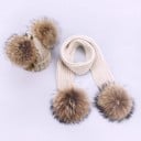 Set aus Wintermütze und Schal für Kinder mit Pompons 1