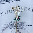 Te-sked med dekorativa blad för kaffe och te Handtag avslutat med en kvist Elegant design Rundad skål Längd 12 cm Metalllegering 4