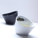 Te-kopp med filter för sypat te Sned form med lock Bladen hålls åtskilda från drycken Material plast Volym 200 ml Mått 12,8 x 9 cm 3