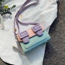 Damernas crossbody-väska med lock och två stora spännen Fyrkantig form Tunn axelrem PU-läder Mått 18 x 13 x 8 cm 9
