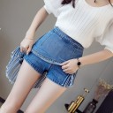 Damjeans mini kjol med inbyggda shorts Asymmetrisk framsida med långa fransar Åtsittande passform Metalldragkedja Bomullsjeans 4