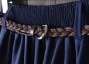 Damernas rynkade midikjol med bälte Bred, fallande snitt Stickad rem med spänne Enfärgad kjol under knäna Polyester 8