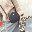 Damsk mini handväska i konstläder 18 x 17 x 7 cm Rund form Dragkedjestängning Lång rem Dekoration i form av en krona 9