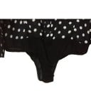 Body de mujer negro con lunares 5