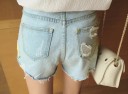 Denimshorts för kvinnor med blommor 5