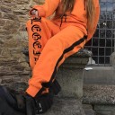 Orange träningsbyxor för kvinnor med bokstäver 6