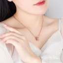 Damhalsband med cirkulärt hänge D514 7