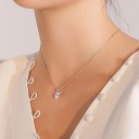 Damhalsband med rosett 6
