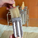 Rostfria formar för 10 popsicles med stativ 3