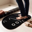 Alfombra de baño 50 x 80 cm en forma de gato enrollado con fondo antideslizante en color negro con dibujo de líneas crema 8