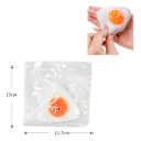 Antistressknådhjälp i form av öga 12,7 × 13 cm mjuk squishy figur vit och gul TPR för hand för avslappning och stressavlastning 2