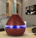 Aroma diffuser voor geurige oliën in de vorm van een druppel Tankinhoud 300 ml Verlichte doorzichtige strook Voeding USB Vermogen 2 W 2