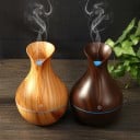 Aroma diffúzor illóolajokhoz váza formájában Műanyag test fa dekorációval és fénycsíkkal Tartály 130 ml Táplálás USB Magasság 15 cm 3
