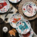 Assiette avec un chat et des ornements 5