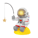 Astronaut en la Luna con estrella 8.5 x 8.5 x 13 cm bloques de construcción LED iluminados Juego de construcción espacial para adultos y niños Modelo educativo creativo del espacio 1