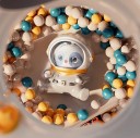 Automat per bambini rosa per giocattoli con luce e suono 10 figure di peluche 10 capsule con sorpresa 12 monete da gioco alimentato a batteria 3