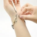Ayudante para llevar y abrochar pulseras 15,4–27 cm Herramienta de metal para joyería Broches Cremalleras Corbatas Ganchos Sujeción rápida Manualidades 2