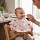 Babete infantil para alimentação 30 x 25 cm Rosa com padrão de dachshunds e quadrados Mangas sobre os ombros Bolsa escondida para migalhas e restos de comida 5