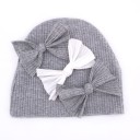 Barnhatt med rosetter 2