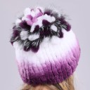 Berretto invernale da donna con pelliccia Superficie pelosa a coste Decorazione con pompon sulla sommità Circonferenza della testa 52 a 60 cm Per 22