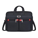 Black laptop bag with handles and shoulder strap Multiple zip compartments Two front pockets with red pulls Polyester 30 x 12 x 40 cm 1