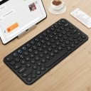 Bluetooth klávesnice s kulatými klávesami ve stylu psacího stroje Kompaktní provedení Anglické rozložení QWERTY Na baterie AAA Plast ABS 2