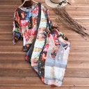 Blusa assimétrica feminina com estampagem floral colorida Corte solto e fluido com mangas de diferentes comprimentos e laço na lateral Poliéster 3