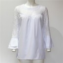 Blusa da donna con décolleté in pizzo e maniche lunghe in pizzo terminate con volant. Collo rotondo. Taglio fluido. Poliestere e spandex. 6